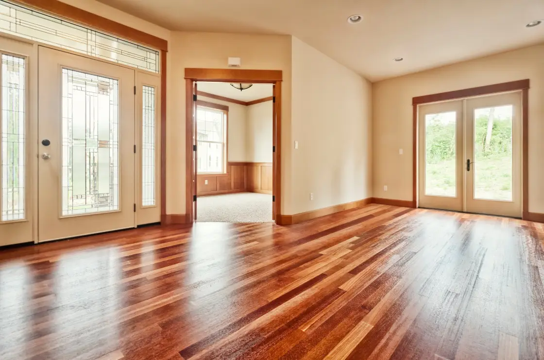 add value with flooring - an open empty room in home showing beautiful hardwood floors