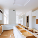 kitchen countertop installation - bright white kitchen missing countertops